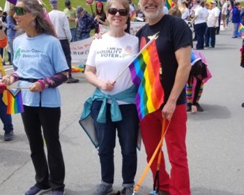 Laura Baker, Sara Salley, Andre Blanchard and terrier Dugan at the Belfast Pride Parade