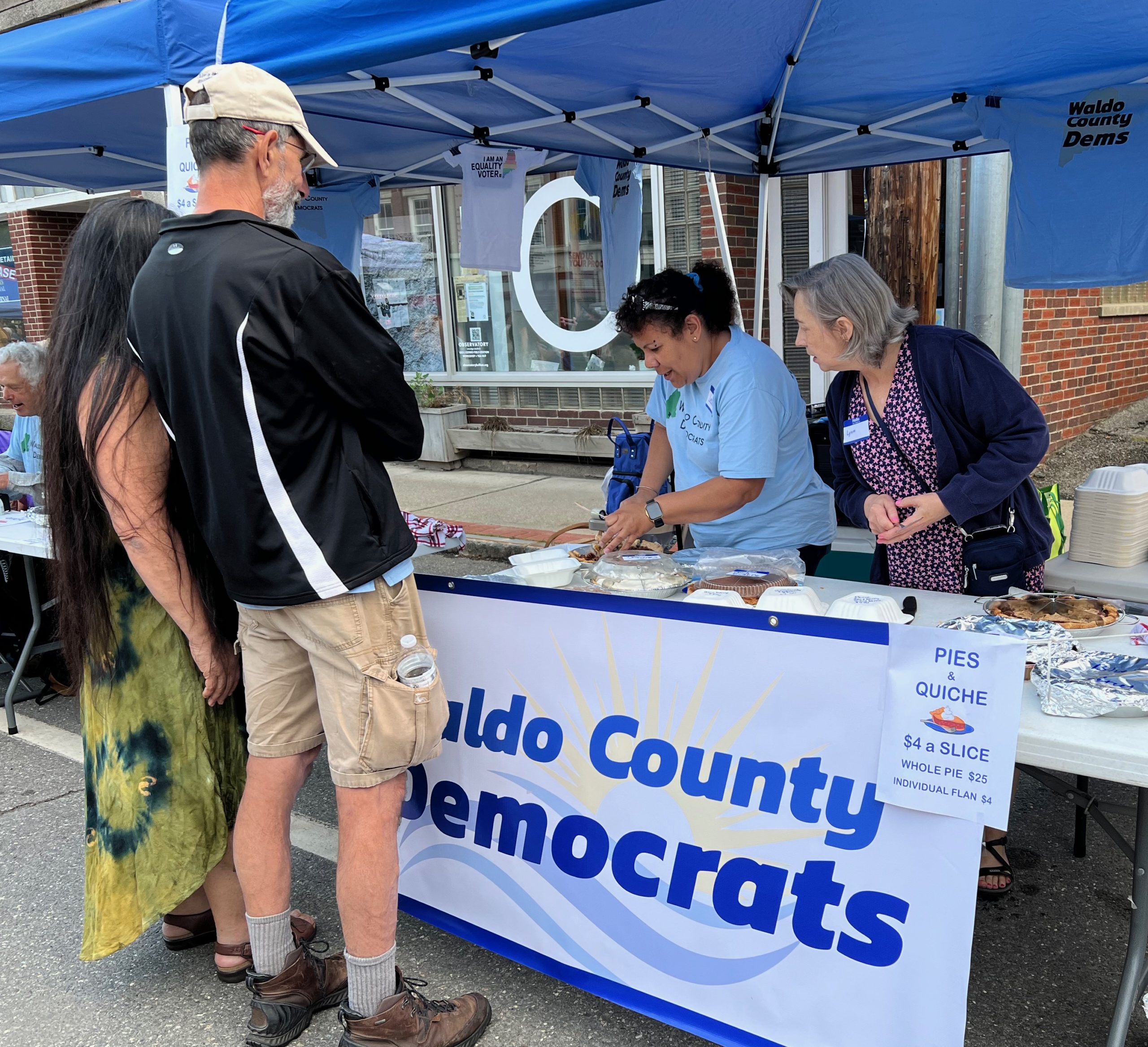 WCDC members serve pie at the Belfast Street Party 2023