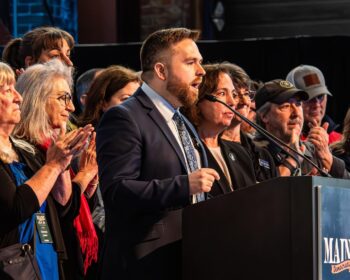 Group of Maine House candidates on 2026 MDP Convention stage.