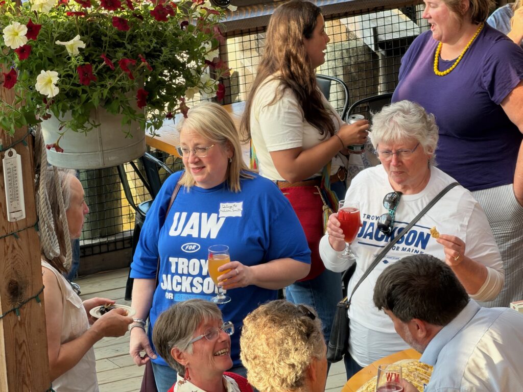 Melissa Smith and another Troy Jackson supporter wearing Jackson t-shirts.